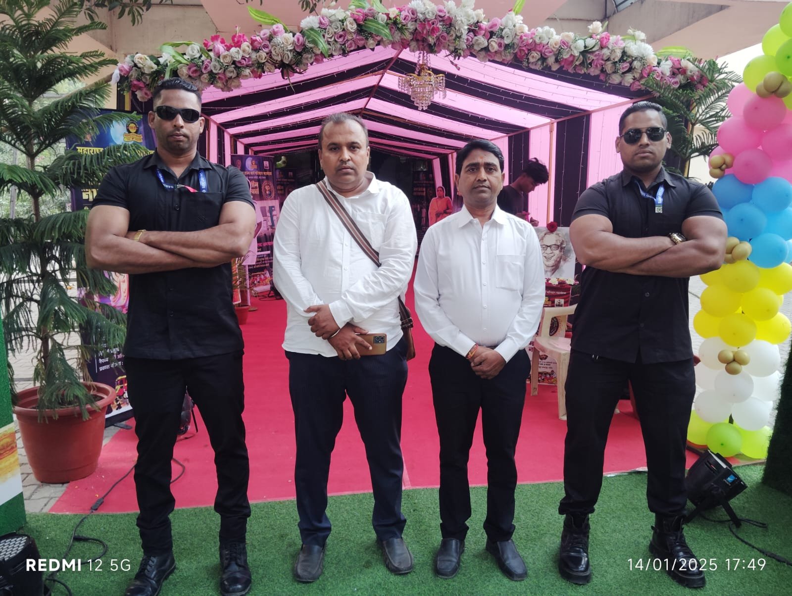 Managing Director Mr. R.R. Shinde with VIP bodyguards at event entrance in Nanded